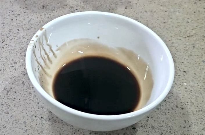 A bowl of crude palm kernel oil