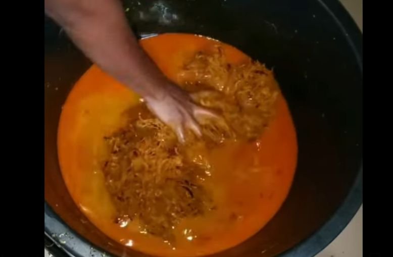 The traditional method of red palm oil production process